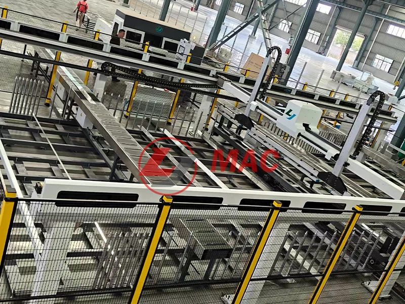 Sistema automático de carga y descarga de barras colectoras
